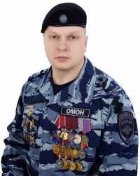 Командир ОМОН Росгвардии Хакасии полковник полиции Андрей Третьяков.